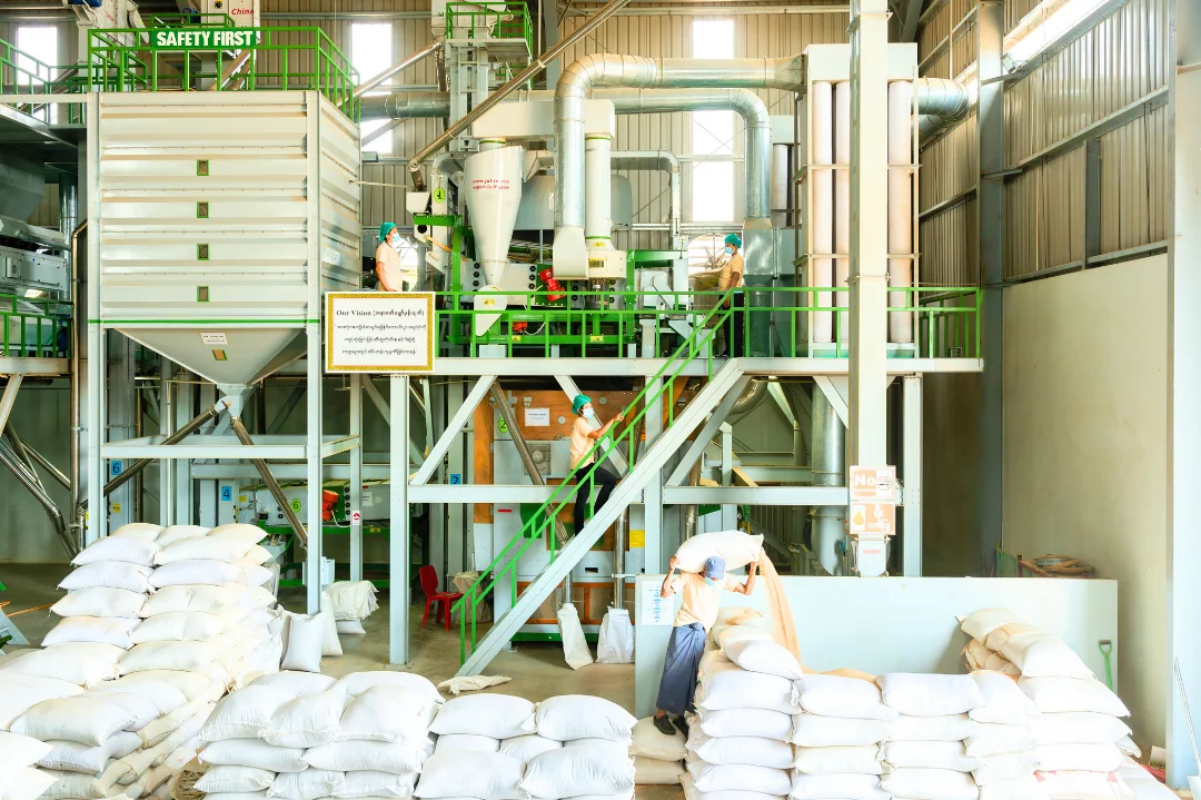 Inside MMTW processing plant with bags and machinery